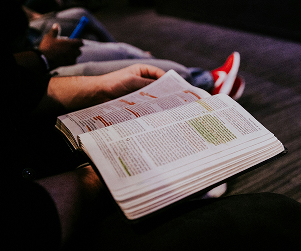 A close up of an open bible