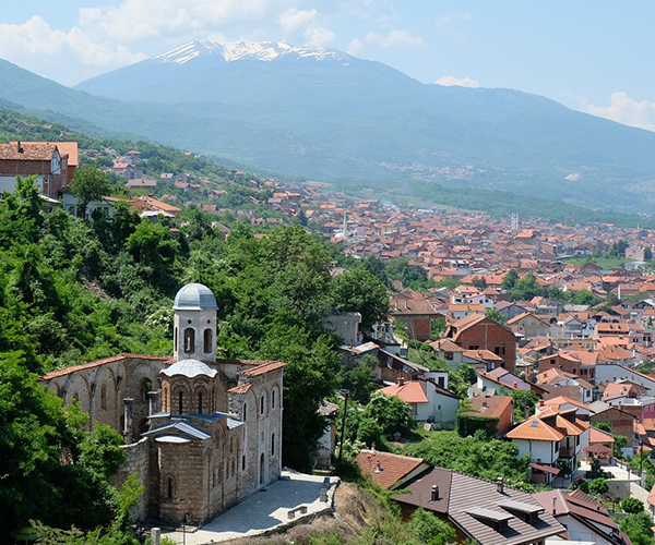 Landscape of a city in Kosovo with mountain in the background